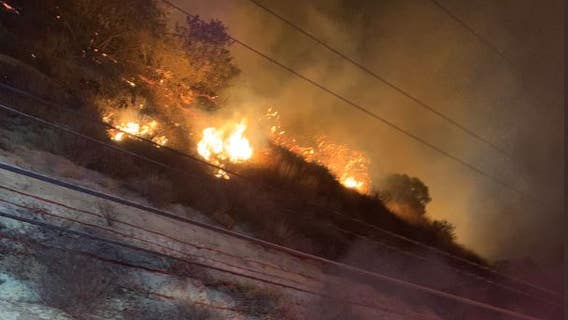 Fire sparks in Santiago Canyon following solo-vehicle crash; driver booked on suspicion of DUI