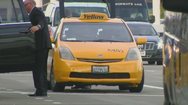 Taxi drivers fight back against plans to halt curbside pickup at LAX