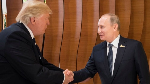 For Trump and Putin, a warm handshake and a long meeting