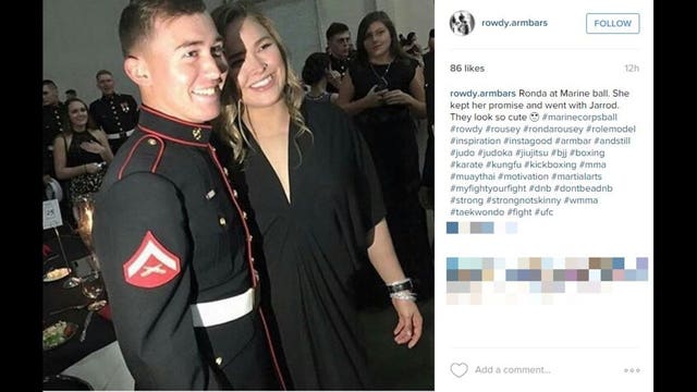 Ronda Rousey keeps promise to Marine, attends Ball as his date