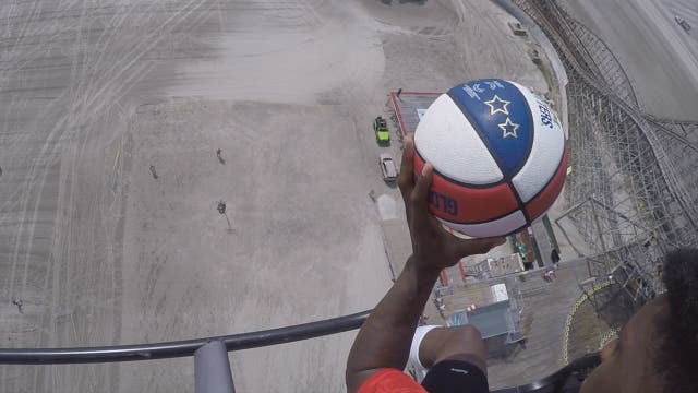 VIDEO: Harlem Globetrotter makes incredible basketball shot from helicopter