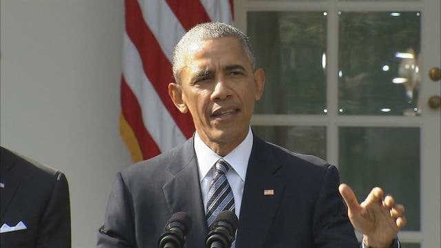Obama, urging unity, says he's rooting for Trump's success