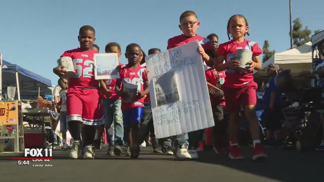 NFL players pay it forward for Compton youth football team