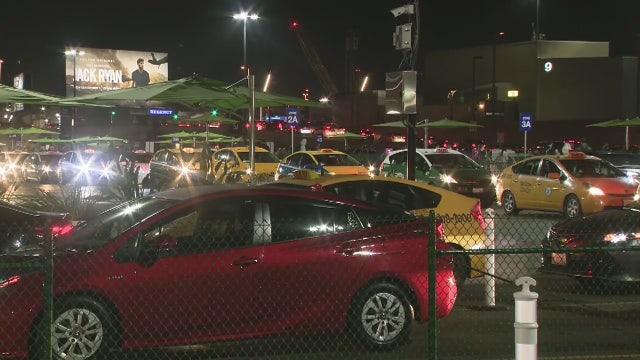 Airport officials add more shuttles to LAX hailing system after passengers express frustrations