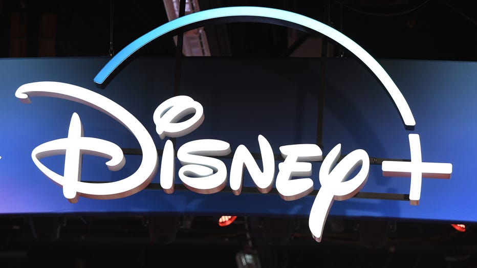 A Disney+ streaming service sign is pictured at the D23 Expo, billed as the