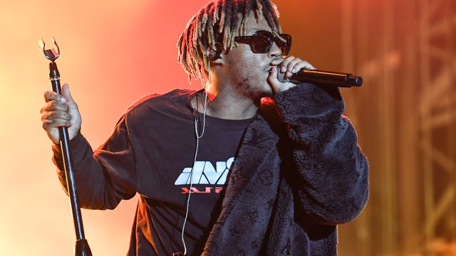 Los Angeles fans hold vigil for late rapper Juice Wrld at sneaker exhibition he invested in