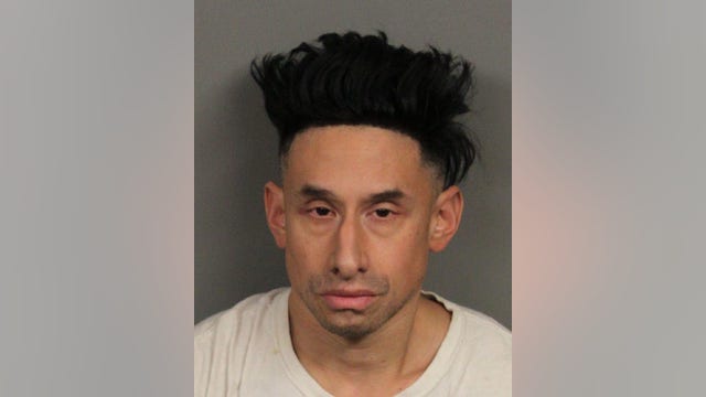 Man arrested after video camera found inside bathroom at grocery store