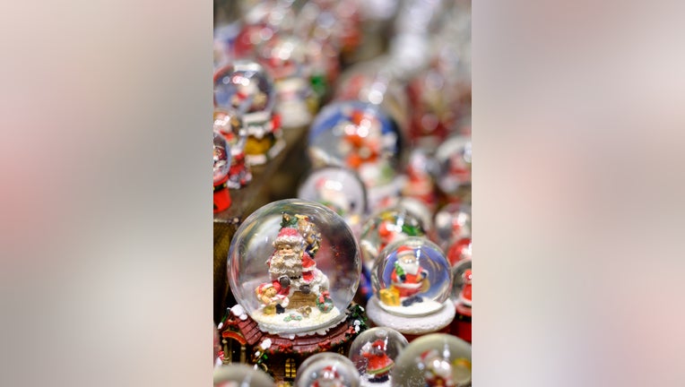 BONN, NORTH RHINE-WESTPHALIA, GERMANY - DECEMBER 7: snow globes are display in the traditional Christmas Market or Weihnachtsmarkt at Bonn on December 7, 2019 in Bonn, Germany. Snow globes are also know as waterglobe, snowstorm or snowdome. (Photo by Thierry Monasse/Getty Images)