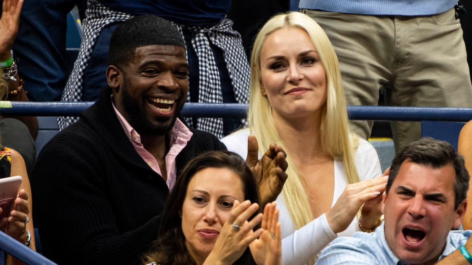 Lindsey Vonn, former World Cup alpine ski racer and partner, and P.K. Subban, Nashville Predators ice hockey player, watch Rafael Nadal of Spain against Daniil Medvedev of Russia in the men's singles final at Arthur Ashe Stadium at the USTA Billie Jean King National Tennis Center on Sept. 8, 2019 in New York City. (Photo by TPN/Getty Images)