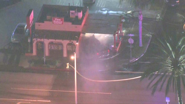 Vehicle crashes into restaurant rupturing gas line