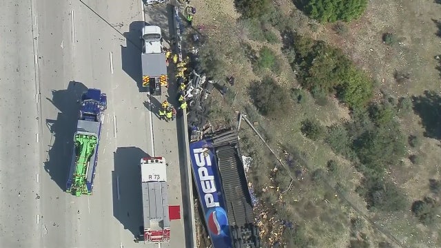 Pepsi truck falls off the 15 Freeway in Fontana, driver airlifted to hospital