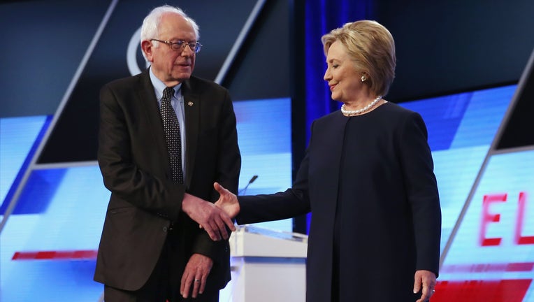 MIAMI, FL - MARCH 09: Democratic presidential candidates Senator Bernie Sanders (D-VT) and Democratic presidential candidate Hillary Clinton shake hands before the Univision News and Washington Post Democratic Presidential Primary Debate on the Miami Dade Colleges Kendall Campus on March 9, 2016 in Miami, Florida. Voters in Florida will go to the polls March 15th for the state's primary. (Photo by Joe Raedle/Getty Images)