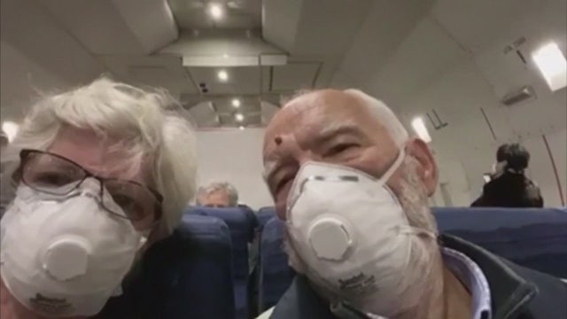 Flights carrying American passengers quarantined on cruise ship in Japan land in California and Texas