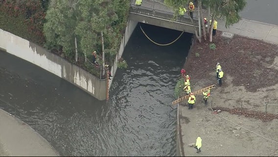 2 people trapped in Lakewood drainage canal, rescue underway