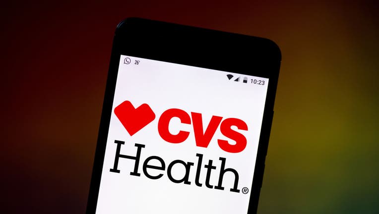 In this photo illustration the CVS Health Corporation logo