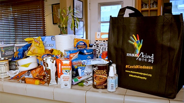 Man/Kind Project helping homeless during COVID-19 pandemic by handing out kindness bags