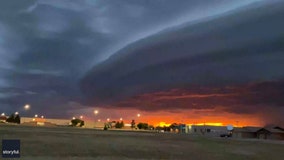 ‘Stunning mothership’ cloud formation looming over city captured on video