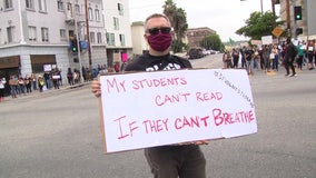 Protesters march in support of defunding LAUSD police