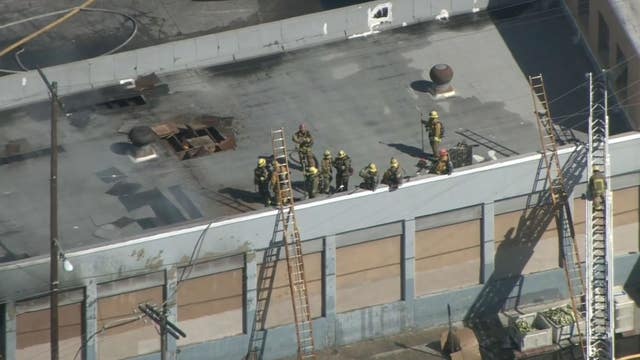 Over 100 firefighters battle blaze in downtown LA produce market; No one injured