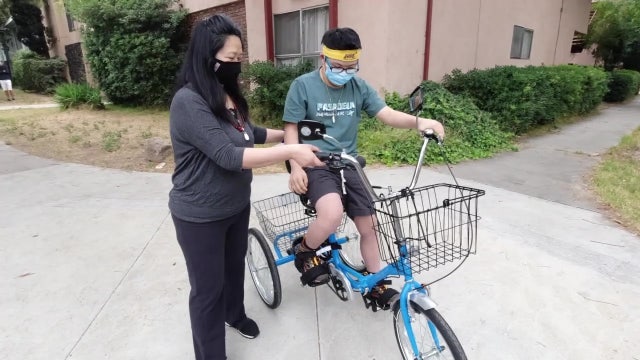 Special needs teen surprised with new tricycle after his was stolen last month in Sherman Oaks