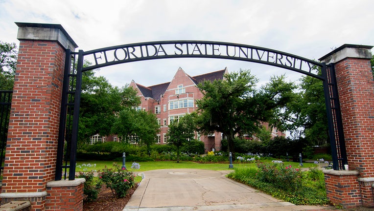 Tallahassee Florida FSU college entrance to school with arch and brick campus