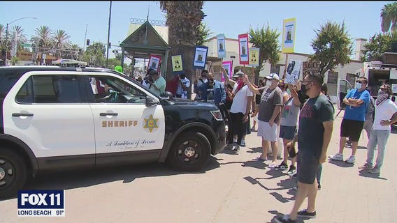 Protesters in support of Andres Guardado remain peaceful as they rally outside Compton’s Sheriff Station