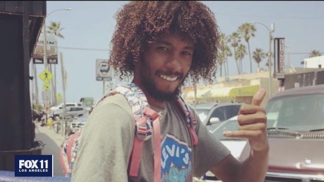 Emotional vigil held for youth coach killed in Ladera Heights; suspect arrested
