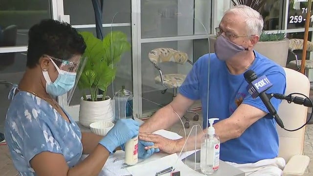 Nail salon in Tustin moves operations outside to keep doors open amid coronavirus closures