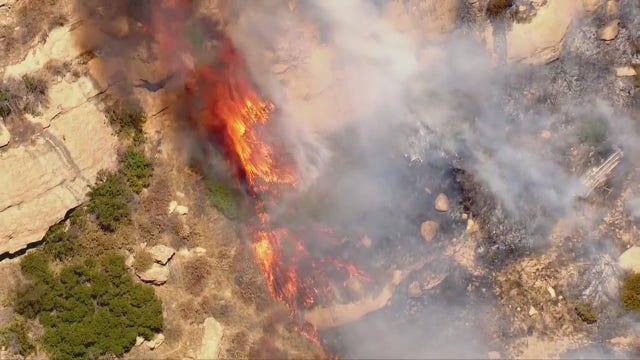 Brush fire sparks near homes near Chatsworth