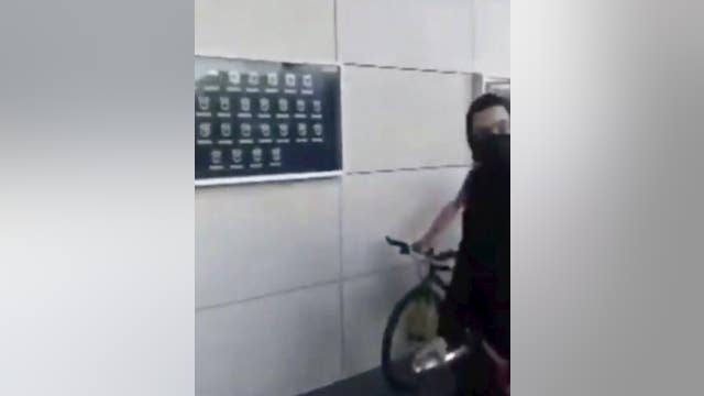 LAPD: Seeking suspects who vandalized memorial display on police building in downtown LA