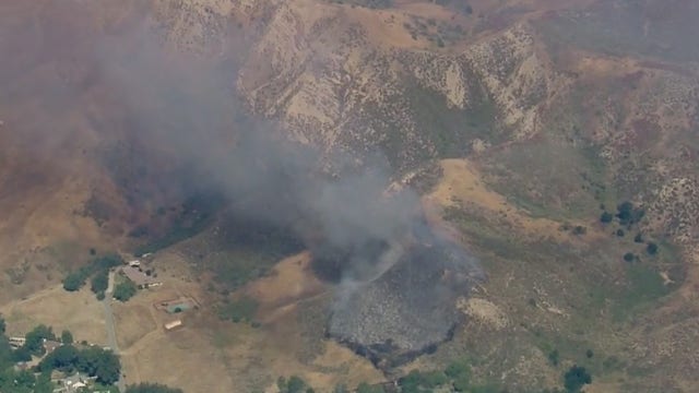 Cambria Fire threatens structures in Newhall