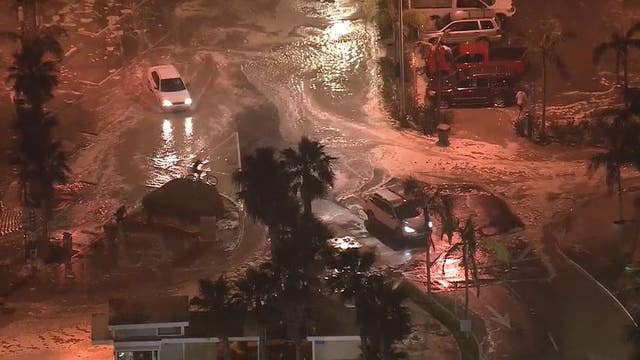 High tide, surf cause major flooding in Newport Beach