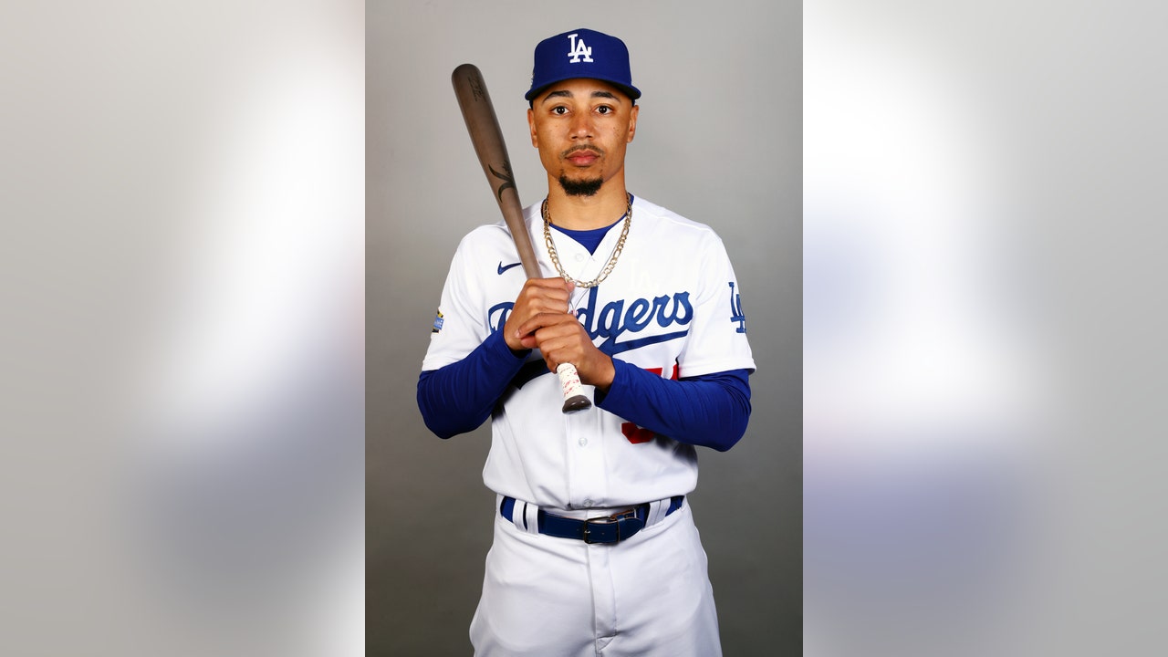 Mookie Betts of the Los Angeles Dodgers poses for a photo with