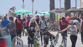 Hermosa Beach to fine people for not wearing face coverings in crowded parts of city, including beach