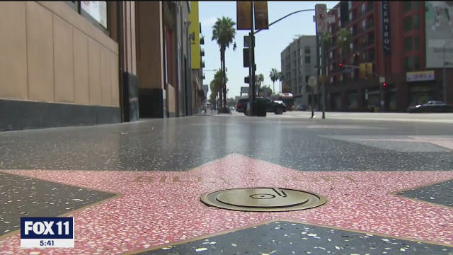 Disturbing images of robbery and attack on transgender women in the heart of Hollywood