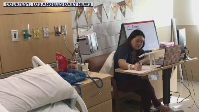 Expectant teacher on bedrest continues to teach virtually