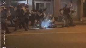 Controversial video of deputy hitting protester with shield now under investigation