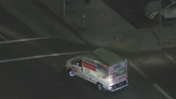 Police pursue reported stolen U-Haul truck from LA to Orange County; suspect taken into custody in Long Beach