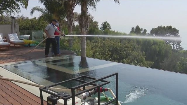 Local firefighters create fire defense system to help homeowners during peak fire season