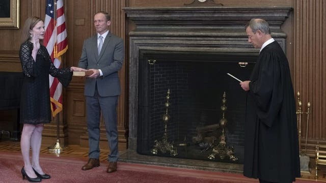 Barrett officially sworn in as Supreme Court justice as John Roberts administers oath in private ceremony