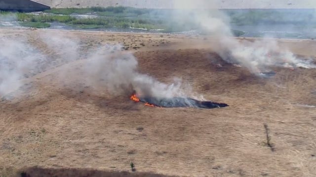 Brush fire in Sepulveda Basin prompts road closure in Van Nuys