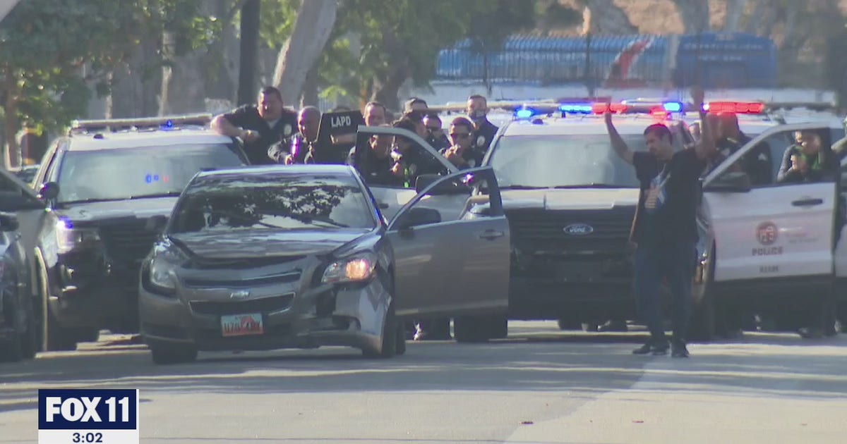 Pursuit suspect, allegedly armed with gun, in custody after brief ...
