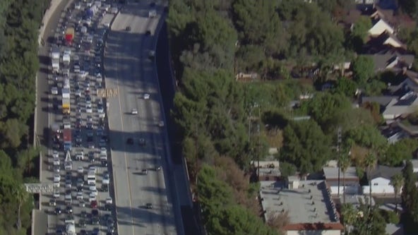 Car fire snarls traffic on 405 Freeway through San Fernando Valley