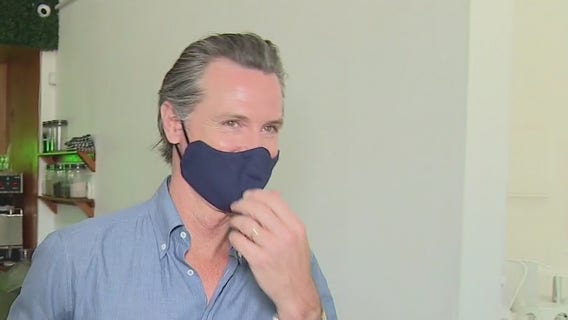 Gov. Newsom back in quarantine after staff member tests positive for COVID-19