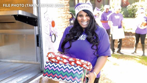 Holiday Heroes: Santa's helper in FedEx purple and a Christmas delivery for adoptive families