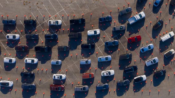 How does California distribute scarce vaccines?