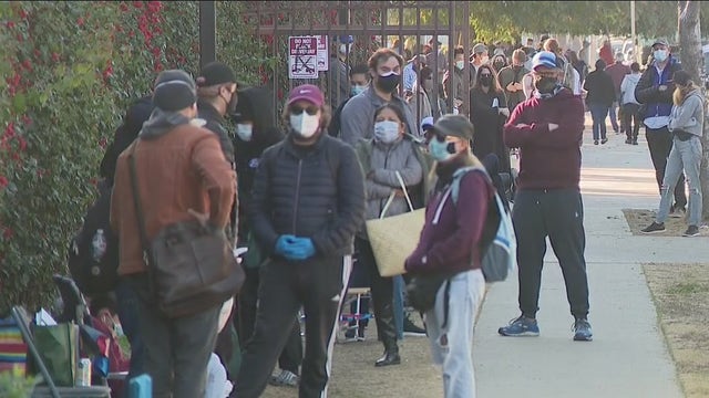 'Vaccine chasers' line up in hopes of getting leftover doses of COVID-19 vaccine