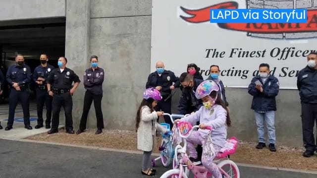 LAPD surprises sisters with bikes after theirs were stolen