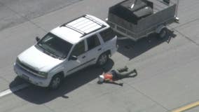 Man arrested in Fontana after slow-speed pursuit on 210 Freeway in SUV hauling a trailer