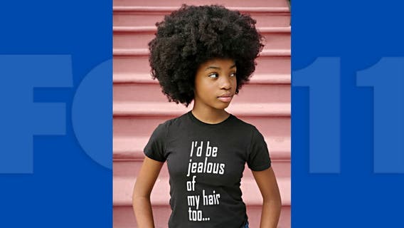 African-American youth runway model inspires as a natural hair advocate